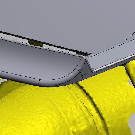 Cross-section showing the upstream Gurney flap and recessed outlet of the Supra GT4+ hood vent