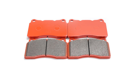 Paragon PBP370 brake pads showing friction faces and red backing plates