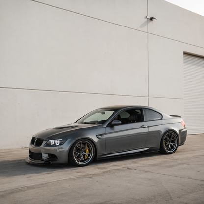 AlpineX Dynamics MP Style Carbon Fiber Side Skirt installed on a BMW E9X M3, shown from the side.