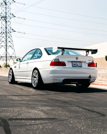 BMW E46 M3 with Ring Spec Wing V2 in rear three-quarter view