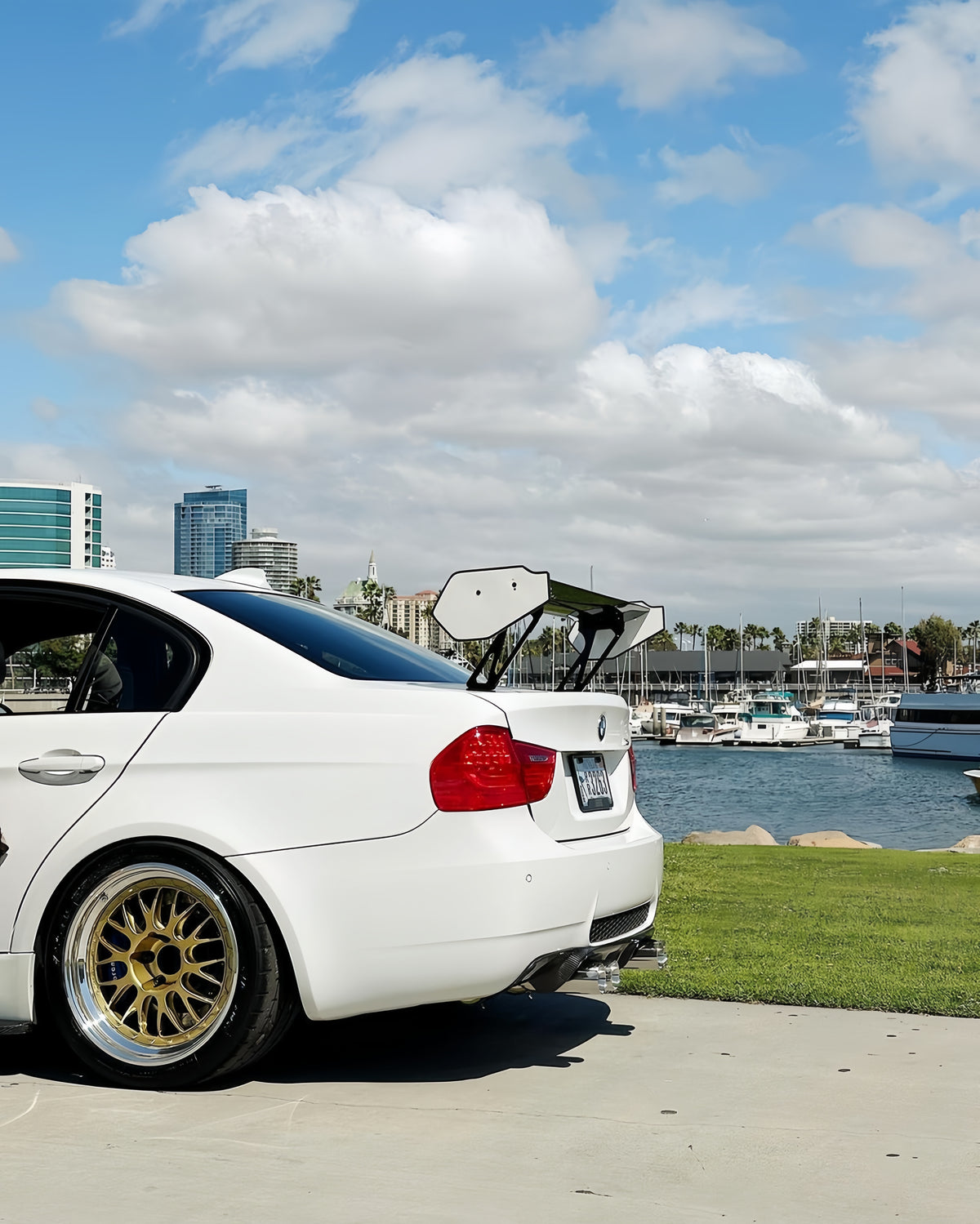BMW E90 M3 with M235iR rear wing viewed from the rear side