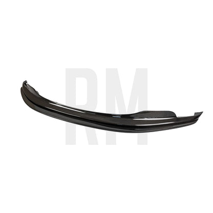 Angled view of the gloss carbon fiber GTS front splitter for the BMW E92 M3