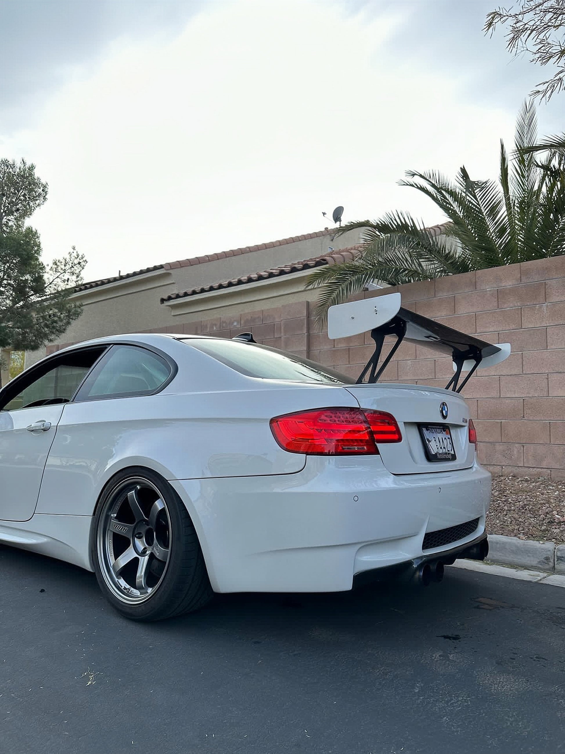 Low-angle rear view of BMW E92 M3 with M235iR rear wing