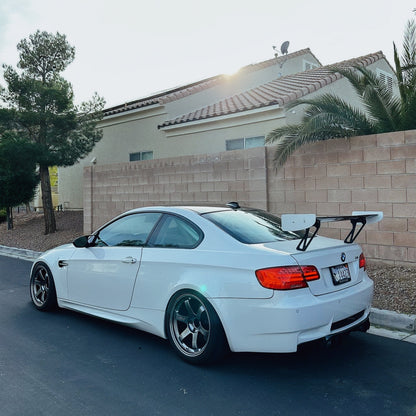 White BMW E92 M3 with M235iR rear wing in rear three-quarter view
