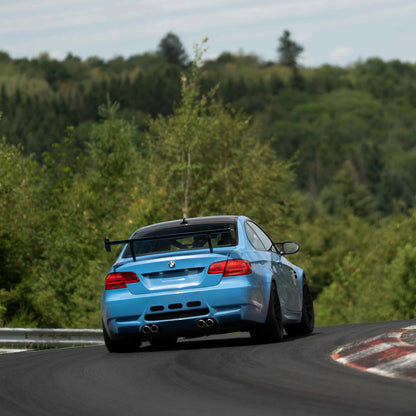 BMW E92 M3 with Ring Spec Wing V2 on track from the rear