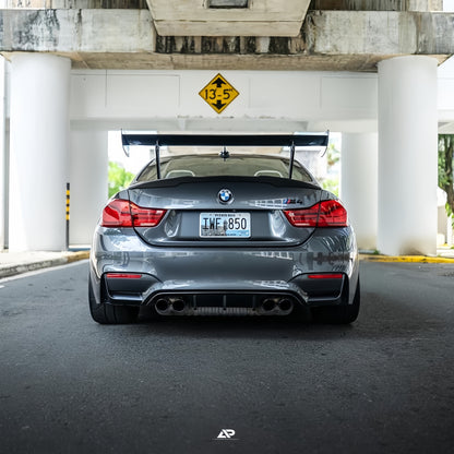 Rear view of BMW F82 M4 with M235iR carbon fiber rear wing