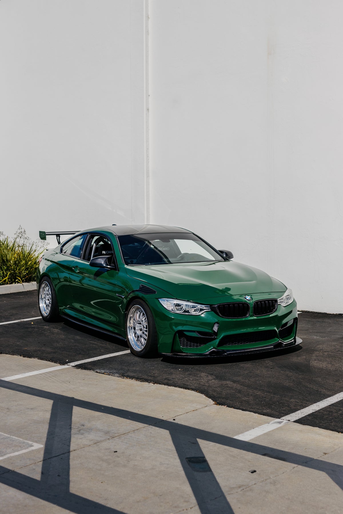 BMW F82 M4 equipped with Ring Spec Wing V2 in front three-quarter view
