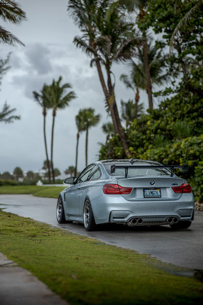 BMW F82 M4 with Ring Spec Wing V2 in rear three-quarter view