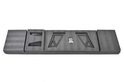 RM Engineering GT4+ wing uprights, carbon fiber endplates, trunk mounting bases and installation hardware in protective packaging