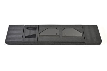 GT4+ rear wing carbon fiber endplates and vehicle-specific trunk mounting bases arranged in protective packaging