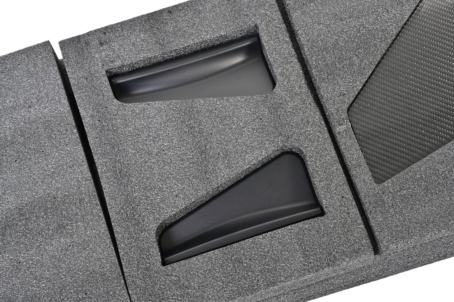 Close-up of the vehicle-specific trunk mounting bases for the BMW F8X GT4+ chassis-mounted rear wing