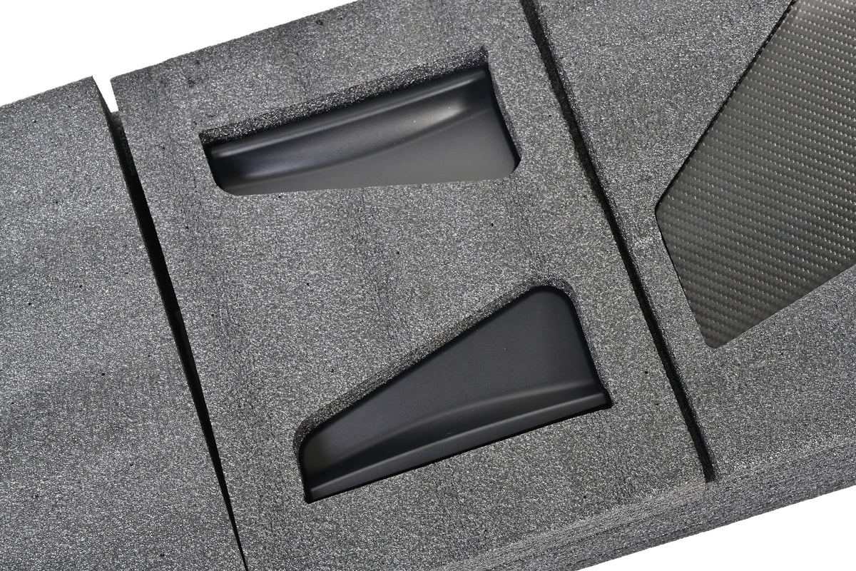 Close-up of the vehicle-specific trunk mounting bases for the BMW F8X GT4+ chassis-mounted rear wing