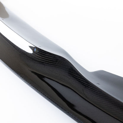 Gloss 2x2 carbon fiber weave detail on BMW E46 M3 GT4 front lip