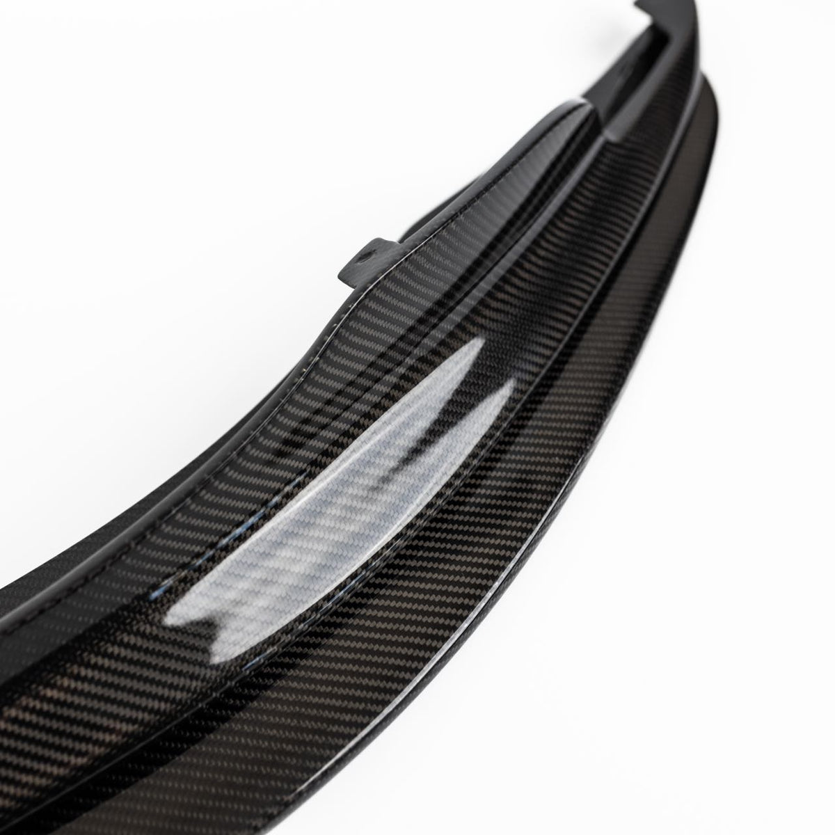 Close-up of the 2x2 carbon fiber weave on the BMW E92 M3 GTS front splitter