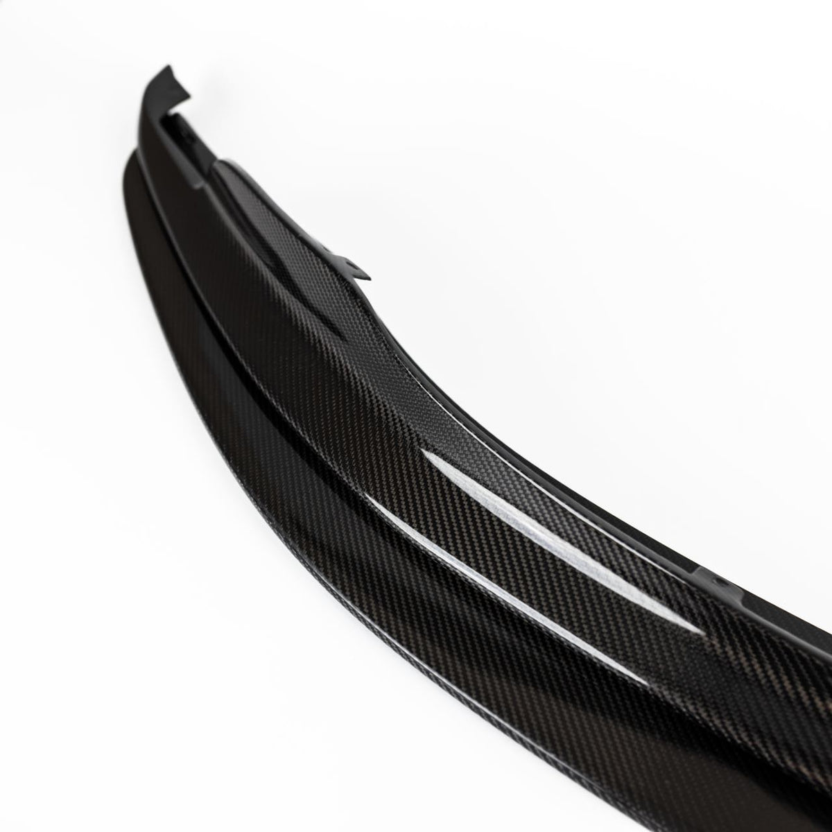 Profile detail of the E9X M3 GTS splitter showing the gloss carbon fiber upper and lower sections