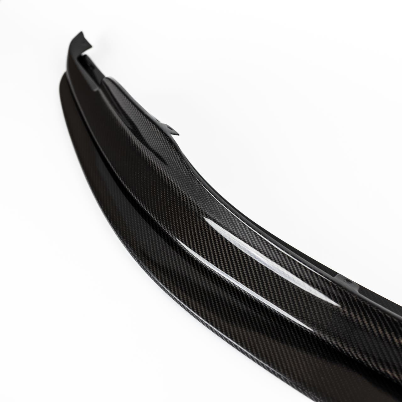 Profile detail of the E9X M3 GTS splitter showing the gloss carbon fiber upper and lower sections