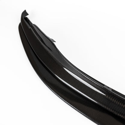 Profile detail of the E9X M3 GTS splitter showing the gloss carbon fiber upper and lower sections