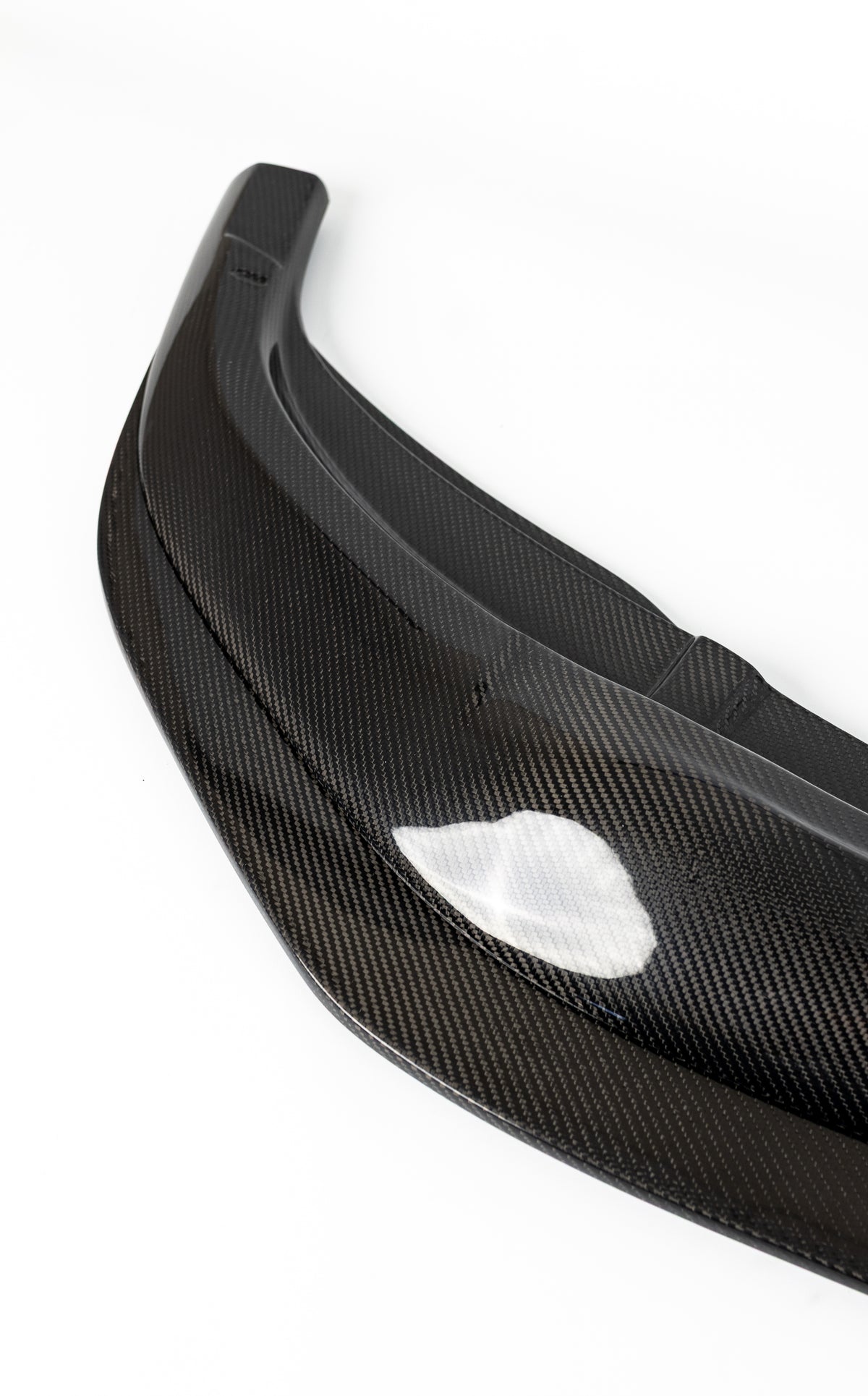 Profile detail of the adjustable carbon fiber front splitter for the BMW F87 M2 Competition