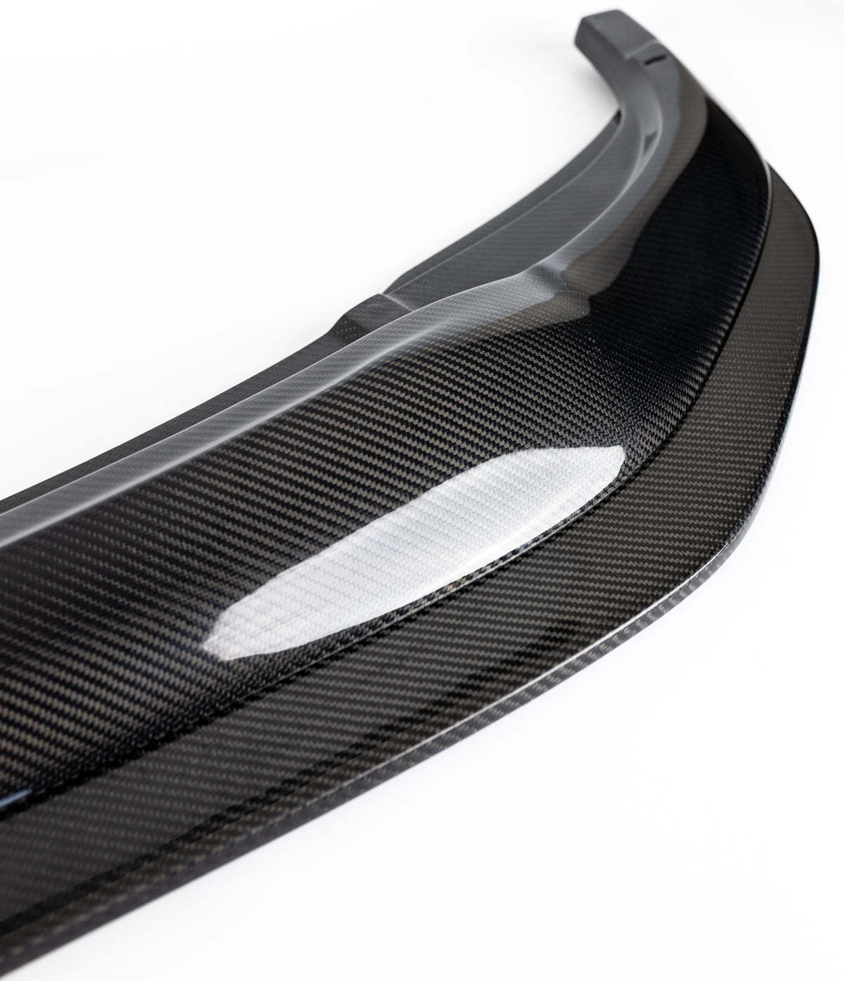 Close-up of the 2x2 carbon fiber weave on the F87 M2 Competition front splitter
