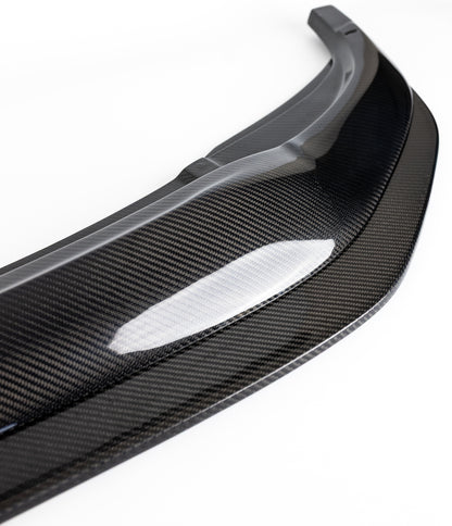 Close-up of the 2x2 carbon fiber weave on the F87 M2 Competition front splitter