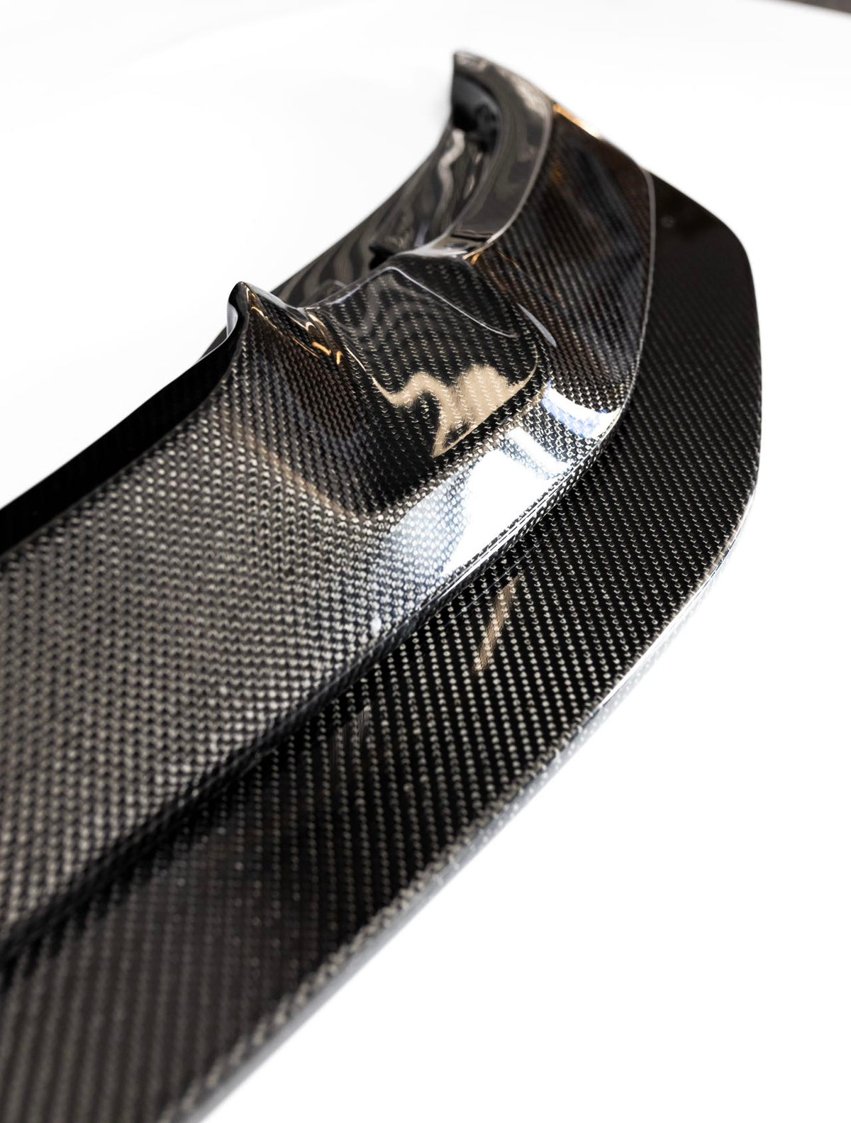 Side detail of the carbon fiber upper lip for the BMW F8X GTS-style front splitter