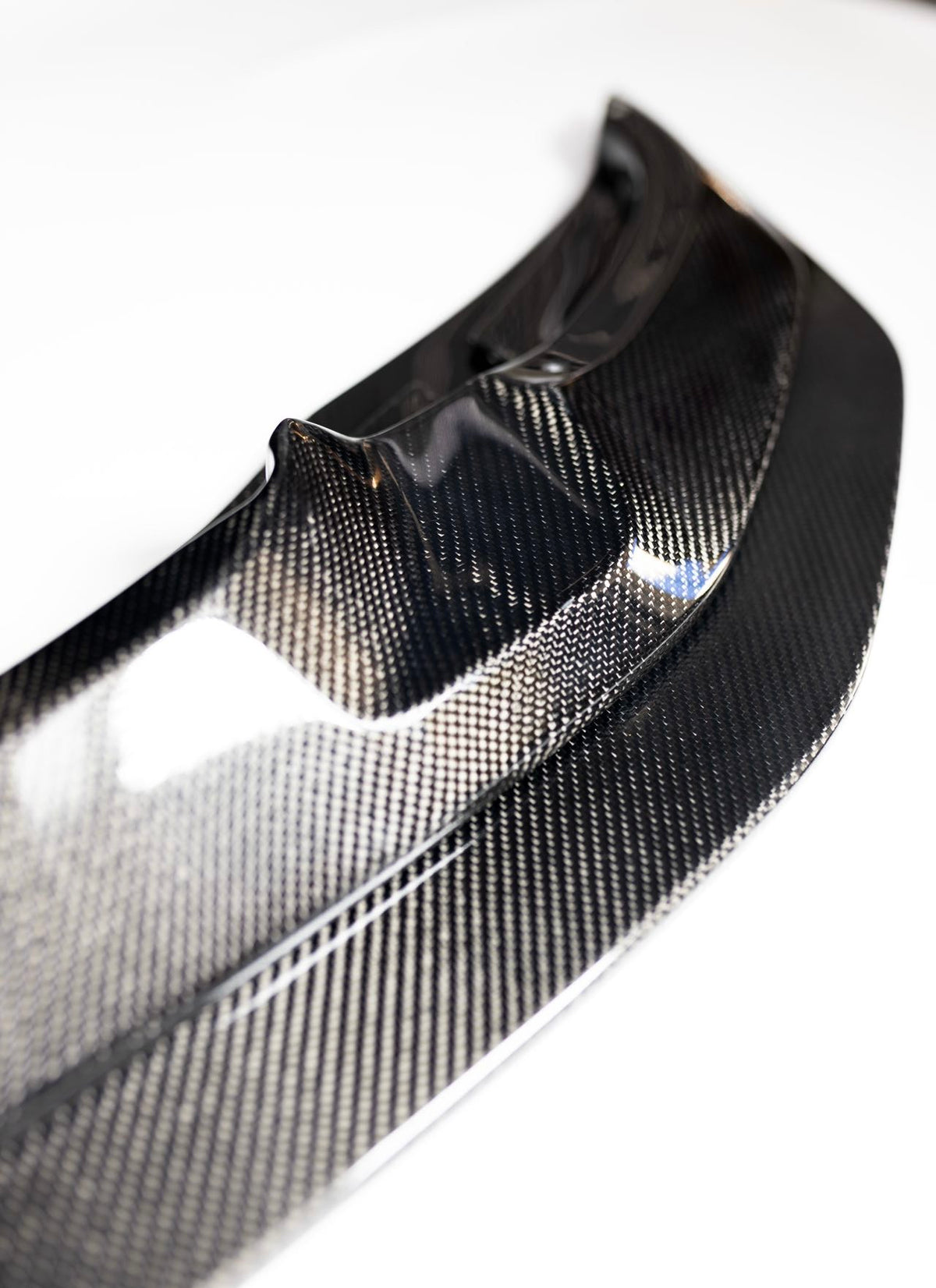 Close-up of the upper carbon fiber lip section for the BMW F8X GTS-style front splitter
