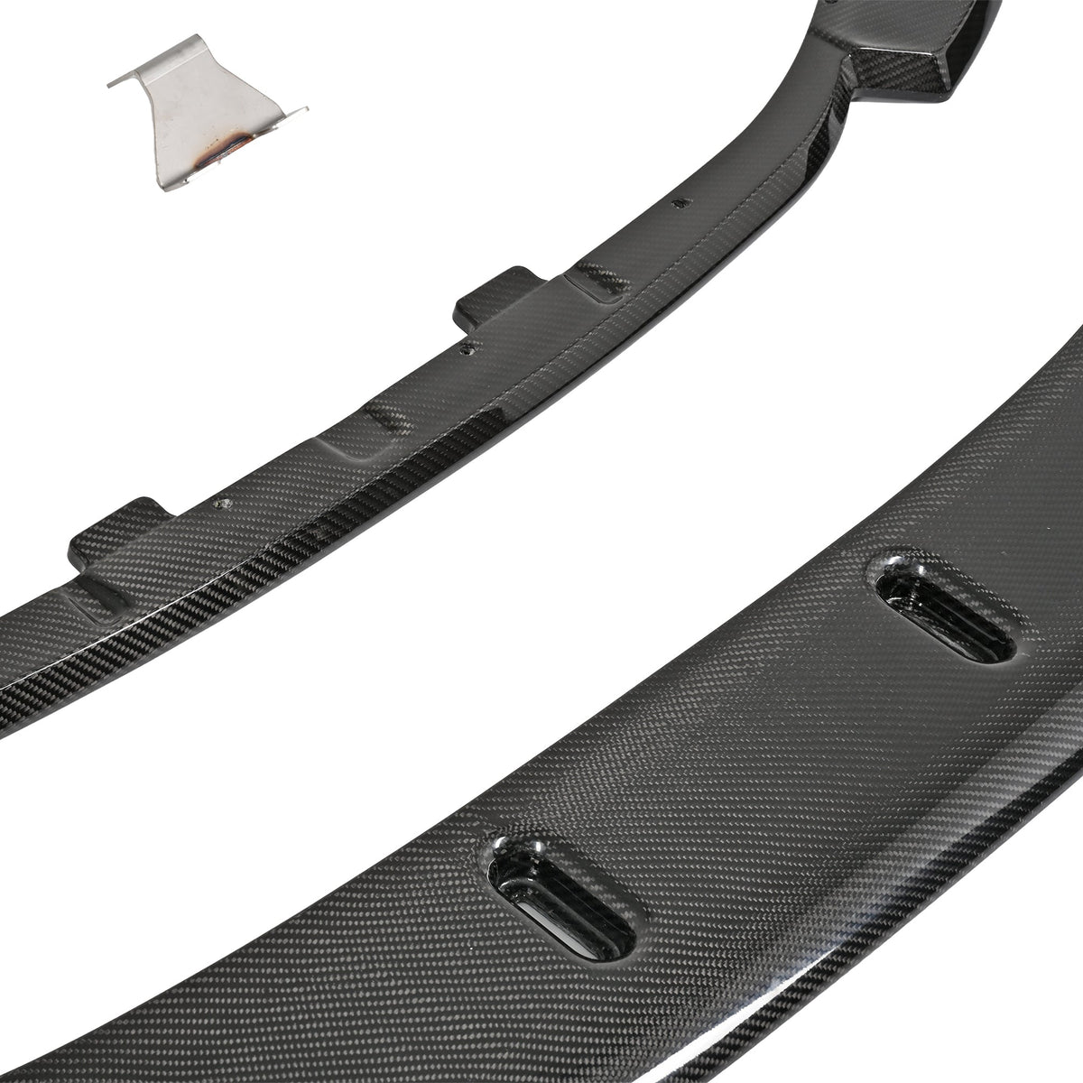 Close-up of the BMW G87 M2 pre-preg carbon fiber upper lip and adjustable lower splitter showing the slotted mounting points
