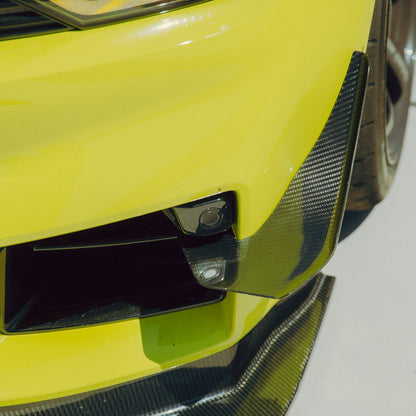 BMW G87 M2 GT4+ carbon fiber canard showing its vehicle-specific position on the outer front bumper