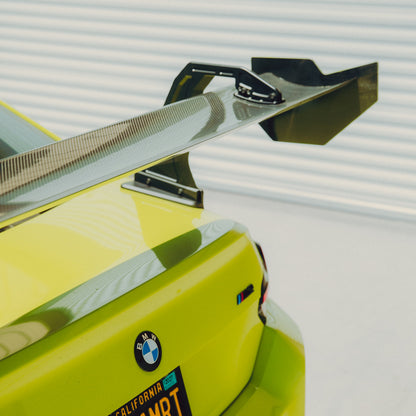 Close-up of the pre-preg carbon fiber mainplane and endplate on the BMW G87 M2 GT4+ rear wing