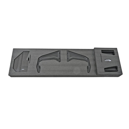 BMW G87 M2 GT4+ rear wing endplates, swan-neck uprights and trunk mounting components secured in protective packaging