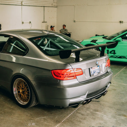 Gray BMW E92 M3 rear view with GT4 MK2 carbon fiber rear wing
