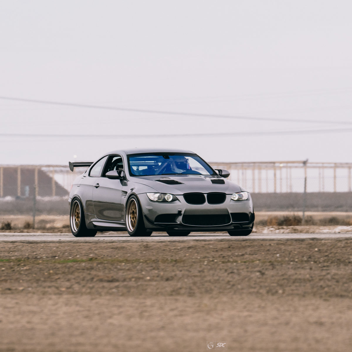 Gray BMW E92 M3 on track with GT4 MK2 rear wing