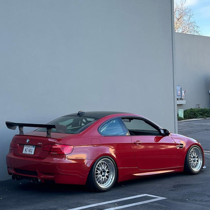 Melbourne Red BMW E92 M3 rear three-quarter view with GT4 MK2 rear wing
