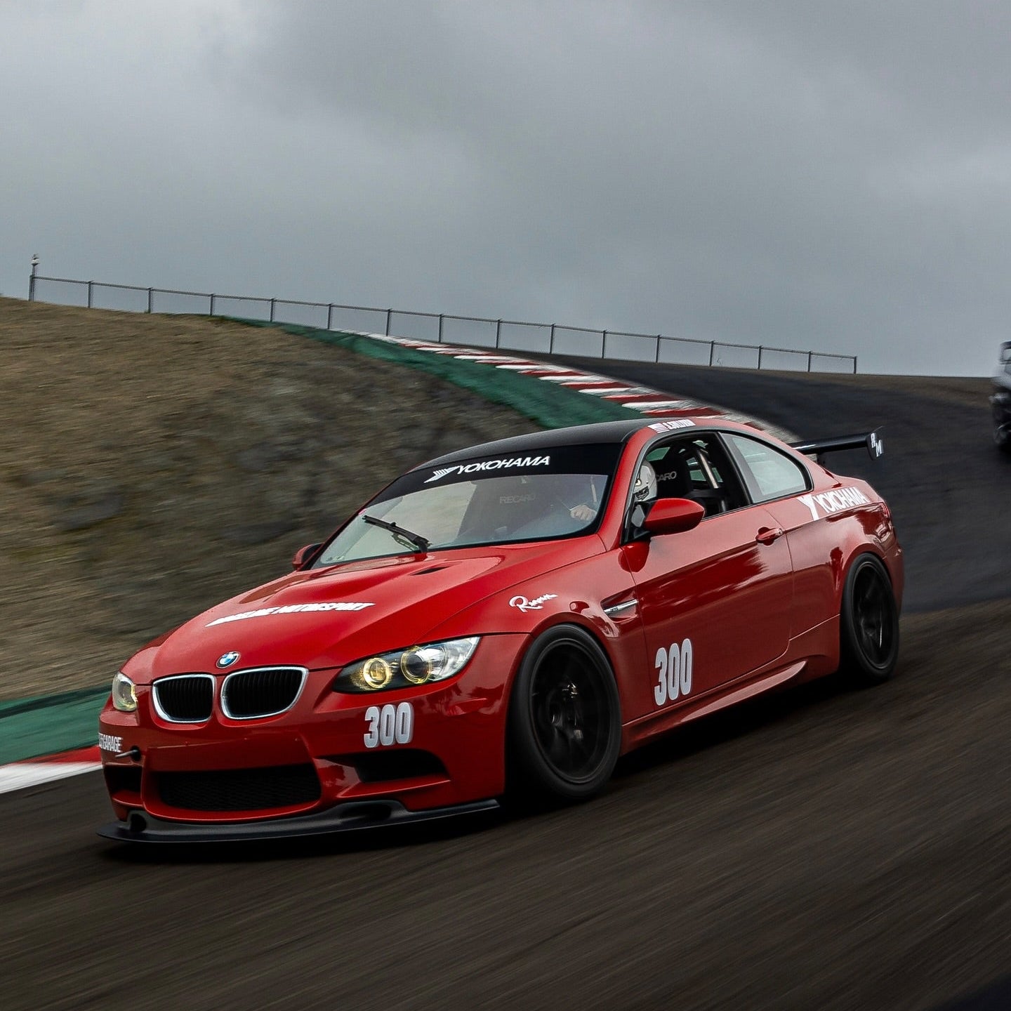 Red BMW E92 M3 track car with GT4 MK2 rear wing