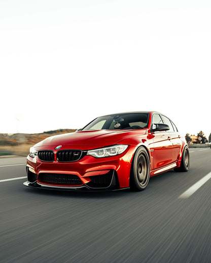 Red BMW F80 M3 driving with GT4 V1 carbon fiber front splitter