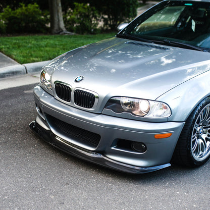 Silver BMW E46 M3 with GT4 carbon fiber front lip installed