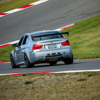 Silver BMW E90 M3 track car with GT4 MK2 rear wing