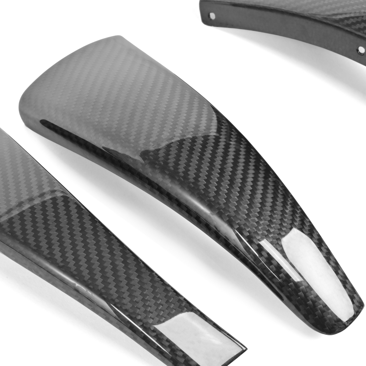Close-up of an RM Engineering carbon fiber front bumper canard for the Toyota GR Supra A90