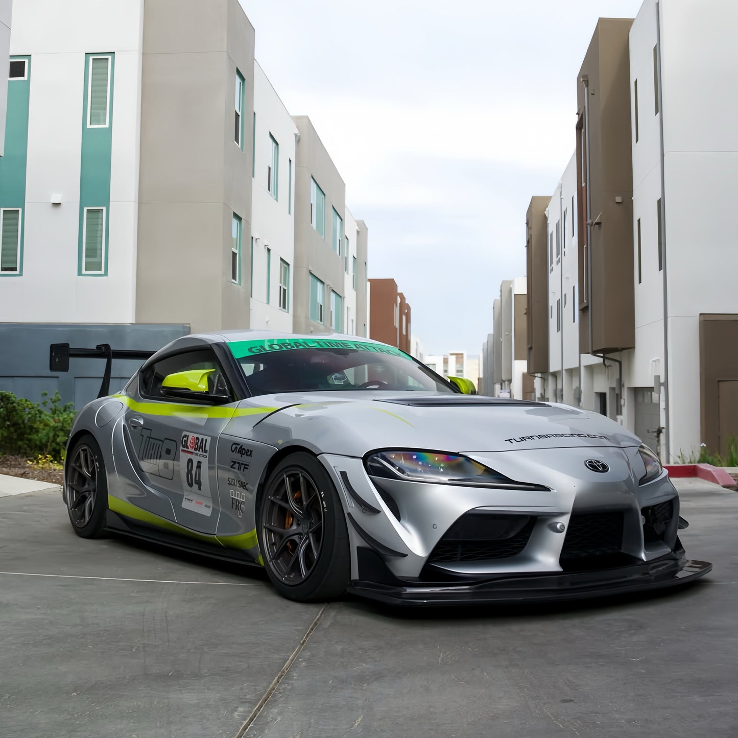 Toyota GR Supra A90 with GT4+ carbon front lip, tunneled splitter, canards, hood vent and rear wing installed