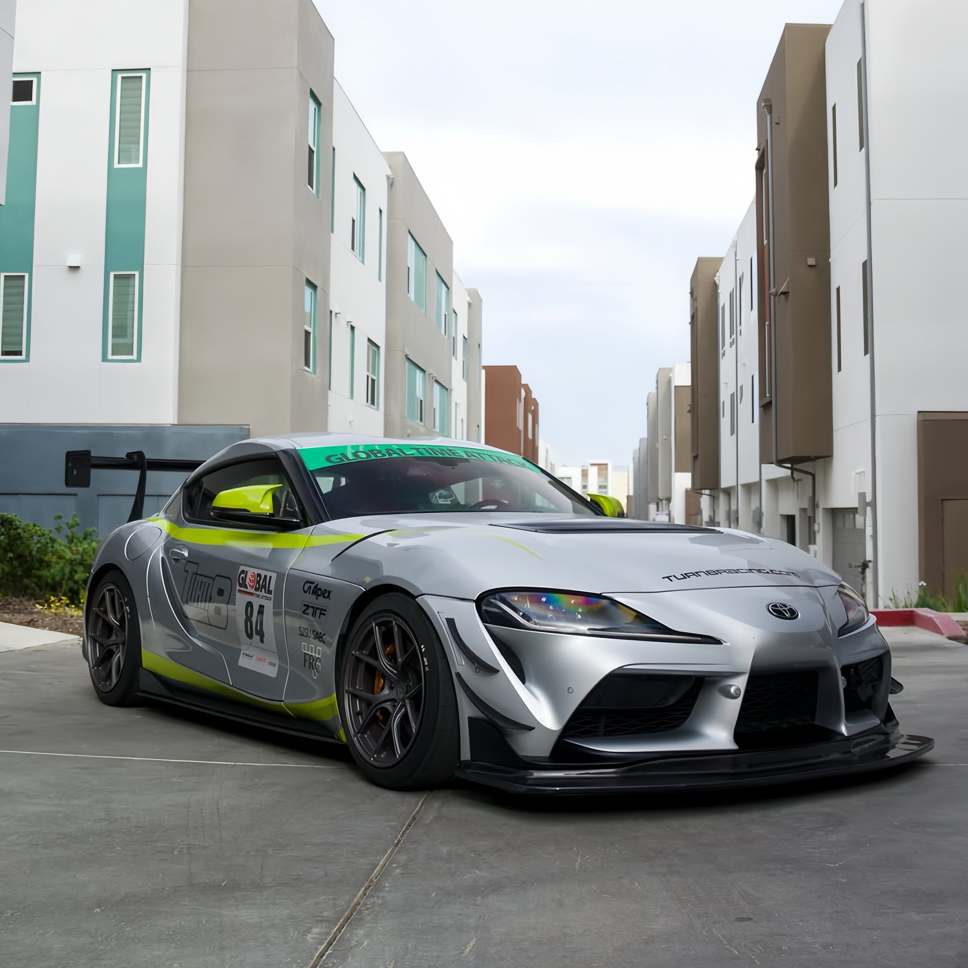 Toyota GR Supra A90 with GT4+ carbon front lip, tunneled splitter, canards, hood vent and rear wing installed