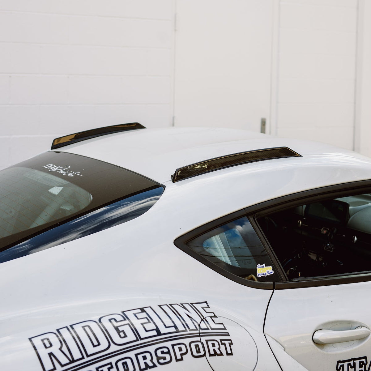 Two-piece carbon fiber roof fin installed along the centerline of a Toyota GR Supra