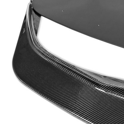 Close-up of the carbon fiber weave and leading edge on the Toyota GR Supra GT4+ front lip and splitter
