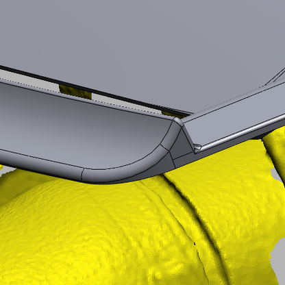 Cross-section showing the upstream Gurney flap and recessed outlet of the Supra GT4+ hood vent
