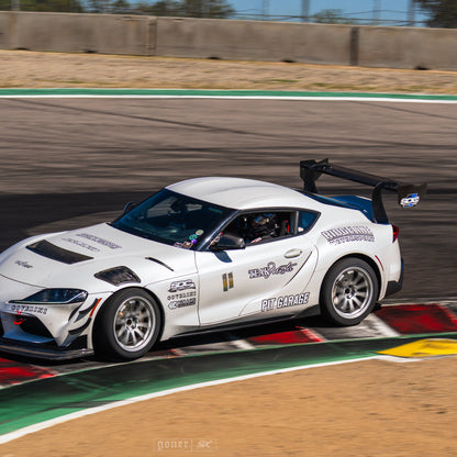 Toyota GR Supra with GT4+ rear wing during on-track aerodynamic testing