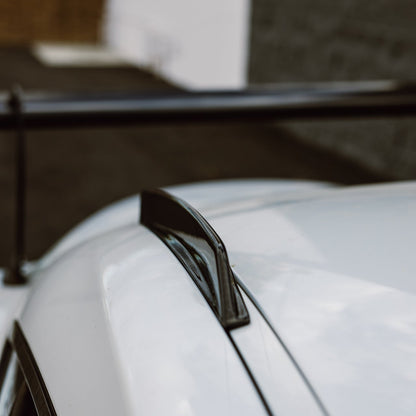 Rear section of the carbon fiber roof fin installed above the Toyota GR Supra rear glass