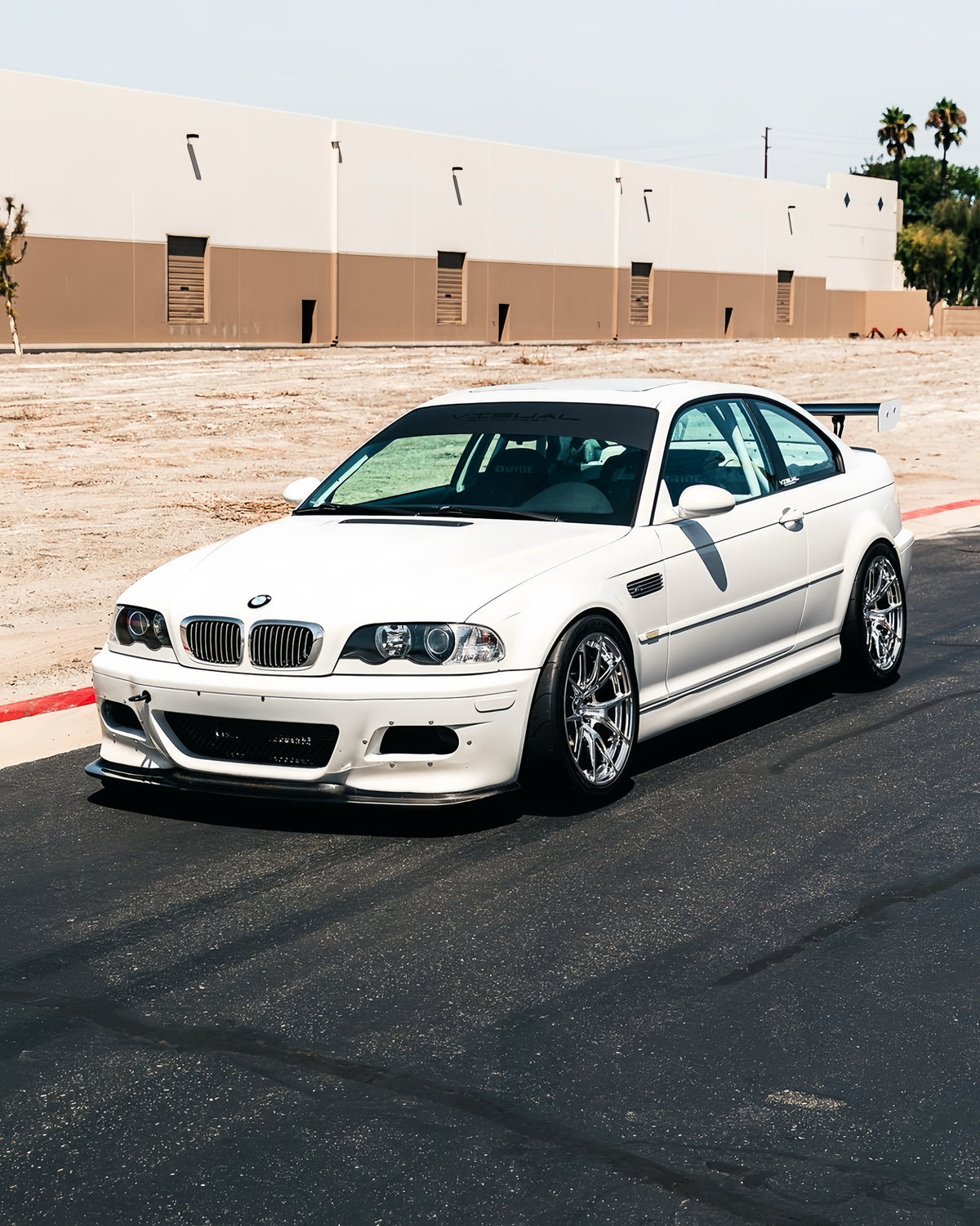 White BMW E46 M3 with Ridgeline Motorsport GT4 carbon fiber front lip