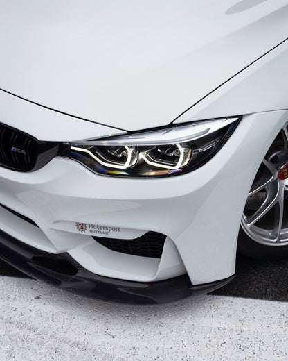 White BMW F82 M4 with Ridgeline Motorsport GT4 V1 carbon fiber front splitter